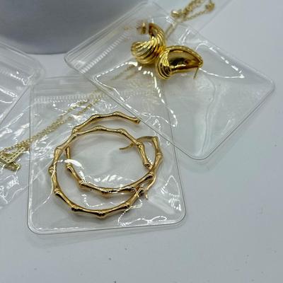 LOT 252J: Two Necklaces, Variety of Earrings & More