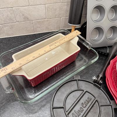 LOT 257K: Baking Collection: Calaphon Muffin Tin, Cast Iron “Una Cosa” Tortilla Press & More