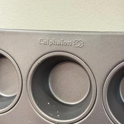 LOT 257K: Baking Collection: Calaphon Muffin Tin, Cast Iron “Una Cosa” Tortilla Press & More