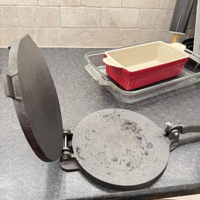 LOT 257K: Baking Collection: Calaphon Muffin Tin, Cast Iron “Una Cosa” Tortilla Press & More