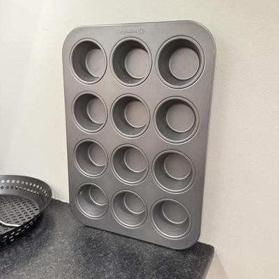 LOT 257K: Baking Collection: Calaphon Muffin Tin, Cast Iron “Una Cosa” Tortilla Press & More