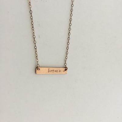 Gold tone brave collar necklace