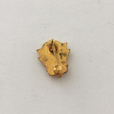 Gold tone vintage small pin