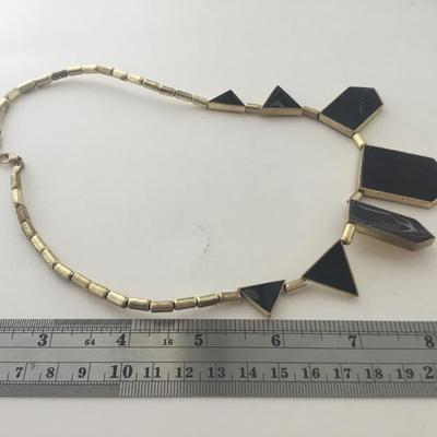 Gold tone black fashion necklace