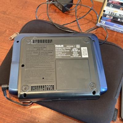LOT 258: RCA Portable DVD Player w/ Misc DVDs