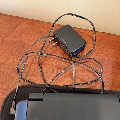 LOT 258: RCA Portable DVD Player w/ Misc DVDs