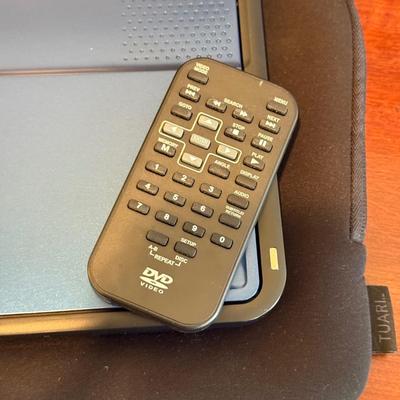 LOT 258: RCA Portable DVD Player w/ Misc DVDs