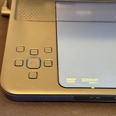 LOT 258: RCA Portable DVD Player w/ Misc DVDs