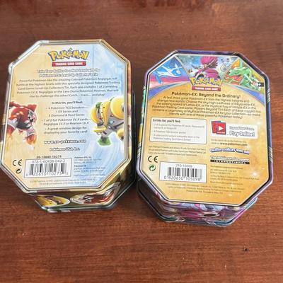 LOT 259D: Sleeved Pokémon Deck, Empty Collectors Tins & More
