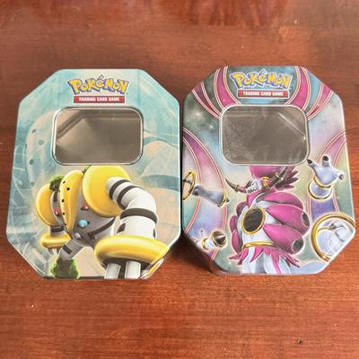 LOT 259D: Sleeved Pokémon Deck, Empty Collectors Tins & More