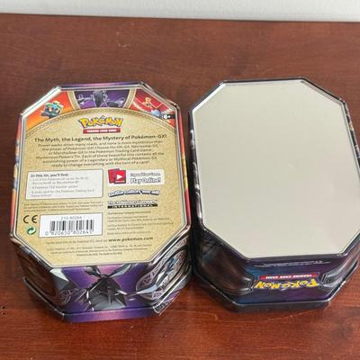 LOT 259D: Sleeved Pokémon Deck, Empty Collectors Tins & More
