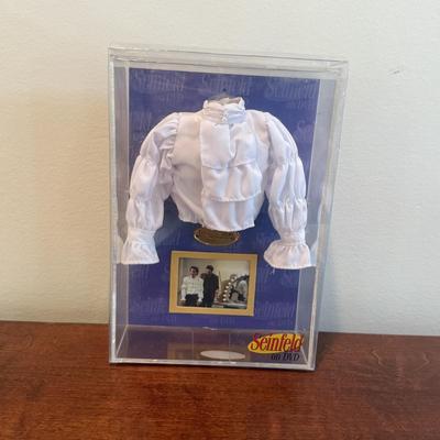 LOT 262K: Seinfeld Collection: Seasons 1&2 on DVD, Puffy Shirt Replica & Notepad Book