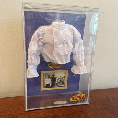 LOT 262K: Seinfeld Collection: Seasons 1&2 on DVD, Puffy Shirt Replica & Notepad Book