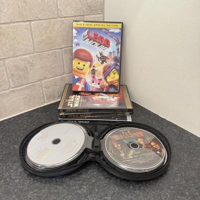 LOT 263: Lego Movie & Star Wars DVDs with Collection of Loose Discs
