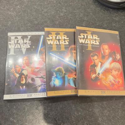 LOT 263: Lego Movie & Star Wars DVDs with Collection of Loose Discs