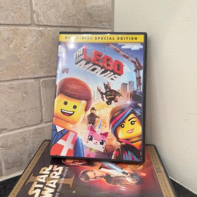 LOT 263: Lego Movie & Star Wars DVDs with Collection of Loose Discs