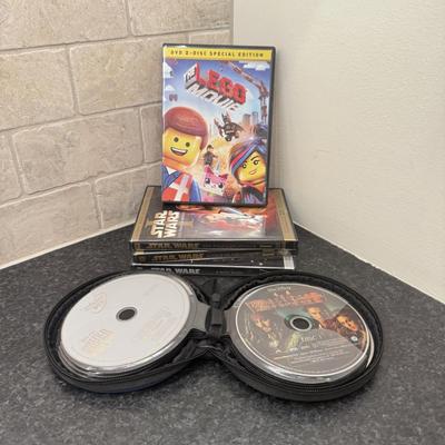 LOT 263: Lego Movie & Star Wars DVDs with Collection of Loose Discs