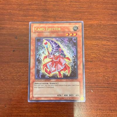 LOT 264: 1996 Yugioh Cards, Heavily Played Pokémon Cards & More