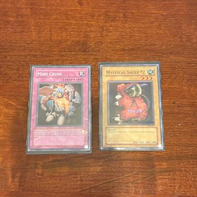 LOT 264: 1996 Yugioh Cards, Heavily Played Pokémon Cards & More