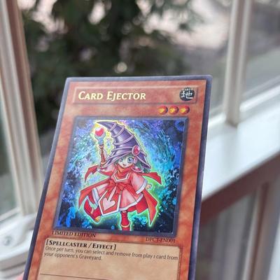 LOT 264: 1996 Yugioh Cards, Heavily Played Pokémon Cards & More