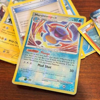 LOT 264: 1996 Yugioh Cards, Heavily Played Pokémon Cards & More