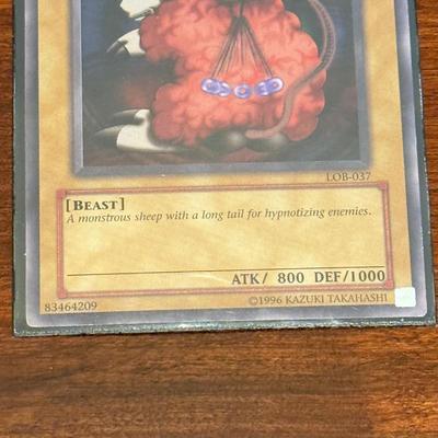 LOT 264: 1996 Yugioh Cards, Heavily Played Pokémon Cards & More