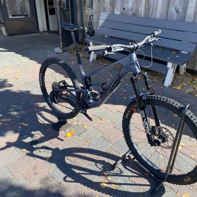 Sale Photo Thumbnail #9: The Santa Cruz Hightower S Kit is a high-quality mountain bike featuring a flat bar handlebar, 29" tubeless tires, and a lightweight carbon fiber frame. This full suspension bike includes adjustable seat, derailleur gears, and hydraulic disc brakes for op