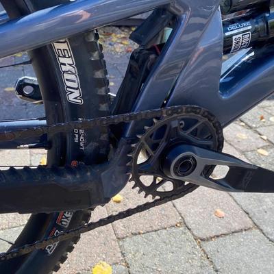 Sale Photo Thumbnail #6: The Santa Cruz Hightower S Kit is a high-quality mountain bike featuring a flat bar handlebar, 29" tubeless tires, and a lightweight carbon fiber frame. This full suspension bike includes adjustable seat, derailleur gears, and hydraulic disc brakes for op