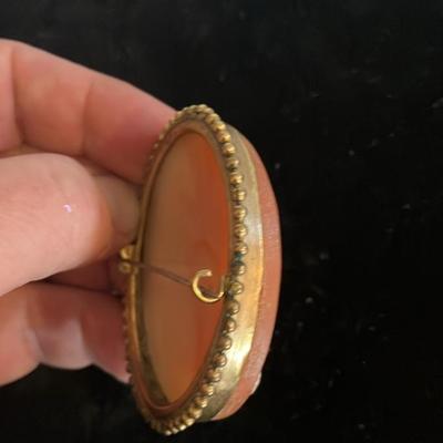 Large Victorian cameo brooch depicting the Three Graces in a gold-toned setting. 2” x 2.5”