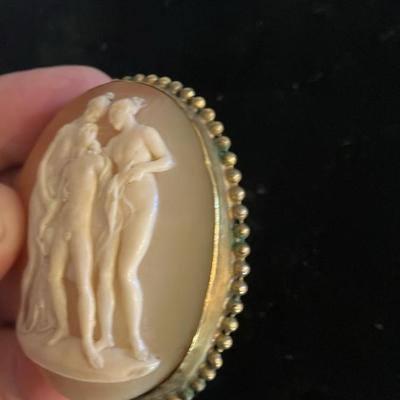 Large Victorian cameo brooch depicting the Three Graces in a gold-toned setting. 2” x 2.5”