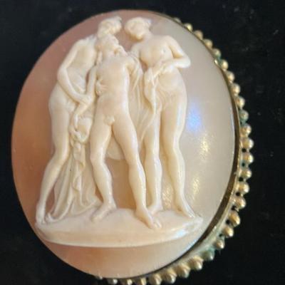 Large Victorian cameo brooch depicting the Three Graces in a gold-toned setting. 2” x 2.5”