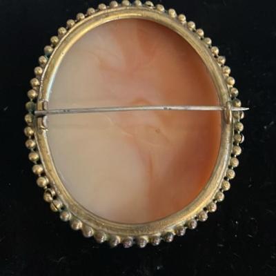Large Victorian cameo brooch depicting the Three Graces in a gold-toned setting. 2” x 2.5”