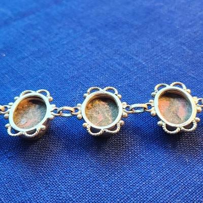 Sale Photo Thumbnail #429: This is a very striking bracelet, the stones are set in sterling silver plate settings.