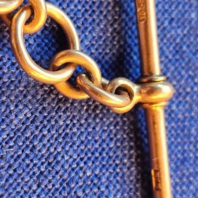 Sale Photo Thumbnail #441: Beautiful swivel watch fob with chain
Marked M & M
15-625   with an anchor mark ( 15-625 is British marking), 15 c gold, 62.5 percent pure)
Victorian  Edwardian  Art Deco Era piece