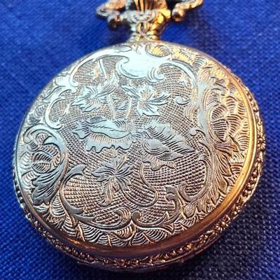 Sale Photo Thumbnail #443: Antimagnetic, made in Hong Kong
embossed hunting scene
It winds easily, and is working