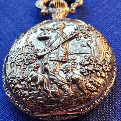 Sale Photo Thumbnail #444: Antimagnetic, made in Hong Kong
embossed hunting scene
It winds easily, and is working