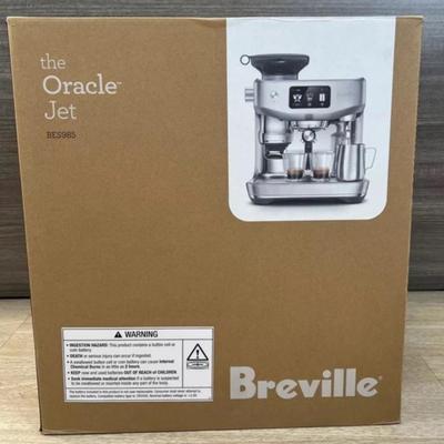 Sale Photo Thumbnail #6: The Breville Oracle Jet Espresso Machine has a powerful 1700W electrical power source and a voltage of 120V. Measuring 14.5 inches in depth, 16 3/4 inches in height, and 15 inches in width, this machine is compact and easy to fit in any kitchen. It weighs