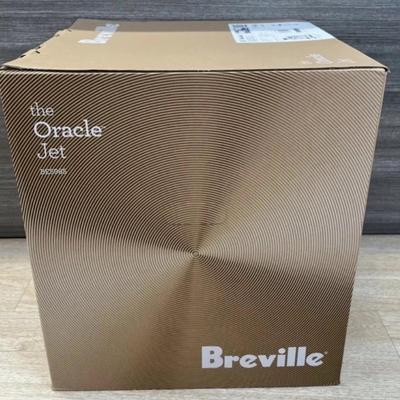 Sale Photo Thumbnail #4: The Breville Oracle Jet Espresso Machine has a powerful 1700W electrical power source and a voltage of 120V. Measuring 14.5 inches in depth, 16 3/4 inches in height, and 15 inches in width, this machine is compact and easy to fit in any kitchen. It weighs