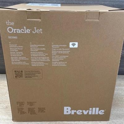 Sale Photo Thumbnail #3: The Breville Oracle Jet Espresso Machine has a powerful 1700W electrical power source and a voltage of 120V. Measuring 14.5 inches in depth, 16 3/4 inches in height, and 15 inches in width, this machine is compact and easy to fit in any kitchen. It weighs