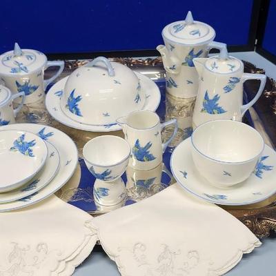 Sale Photo Thumbnail #480: This spectacular setting comes just as it was used for many many years for a ladies breakfast!
Included with this magnificent setting is the silver plate butlers tray. 
This is bone chine, dating from 1909 to 1910, made in England.
Included are:  2 piece 