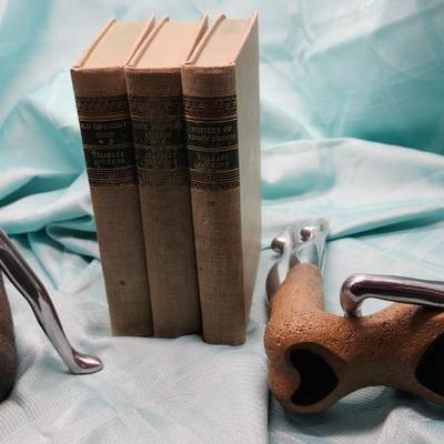 Sale Photo Thumbnail #485: Modernist mannequin like bookends
Stylized female mixed media mannequins
Mirrored chrome and stone finish
9 inches tall x 7 inches wide 
very good condition
Retail is up to $1300