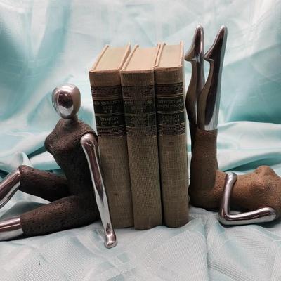 Sale Photo Thumbnail #486: Modernist mannequin like bookends
Stylized female mixed media mannequins
Mirrored chrome and stone finish
9 inches tall x 7 inches wide 
very good condition
Retail is up to $1300