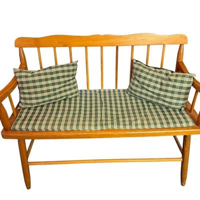 Bench with pillows and seat cushion