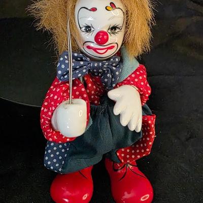 Vintage Porcelain Clown Doll with Colorful Outfit and Balloons – Whimsical Collector’s Treasure