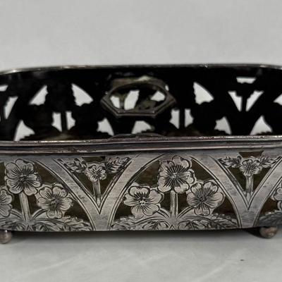 Sale Photo Thumbnail #155: The tray is made by the Forbes Silver Company and is silver-plated. It is described as a "quadruple plate," which refers to a specific type of silver-plating process