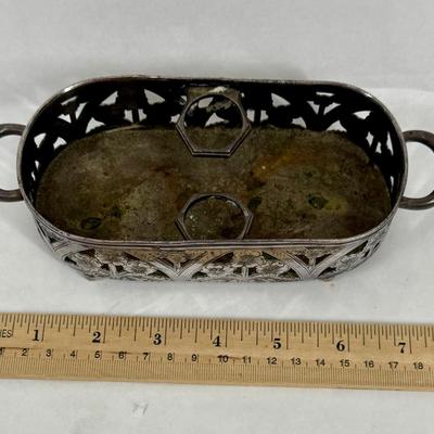 Sale Photo Thumbnail #149: The tray is made by the Forbes Silver Company and is silver-plated. It is described as a "quadruple plate," which refers to a specific type of silver-plating process
