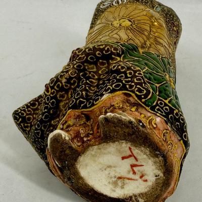 Sale Photo Thumbnail #139: Buddhist figurine of Guanyin, also known as Kannon in Japan. Satsuma ware is a type of Japanese earthenware known for its detailed, hand-painted designs and often features raised gold accents, known as moriage.  Some visible crazing on the face and chest,
