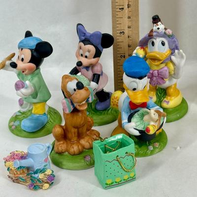 Sale Photo Thumbnail #253: Set of Disney Easter figurines. The figurines are Mickey Mouse, Minnie Mouse, Donald Duck, Daisy Duck, and Pluto