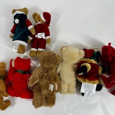 Sale Photo Thumbnail #127: 9 bears. Various colors and costumes, some are dressed like Santa.  All in good condition.