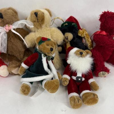 Sale Photo Thumbnail #129: 9 bears. Various colors and costumes, some are dressed like Santa.  All in good condition.